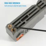 Mini hex wrench adjusting the depth of blades on a tool.