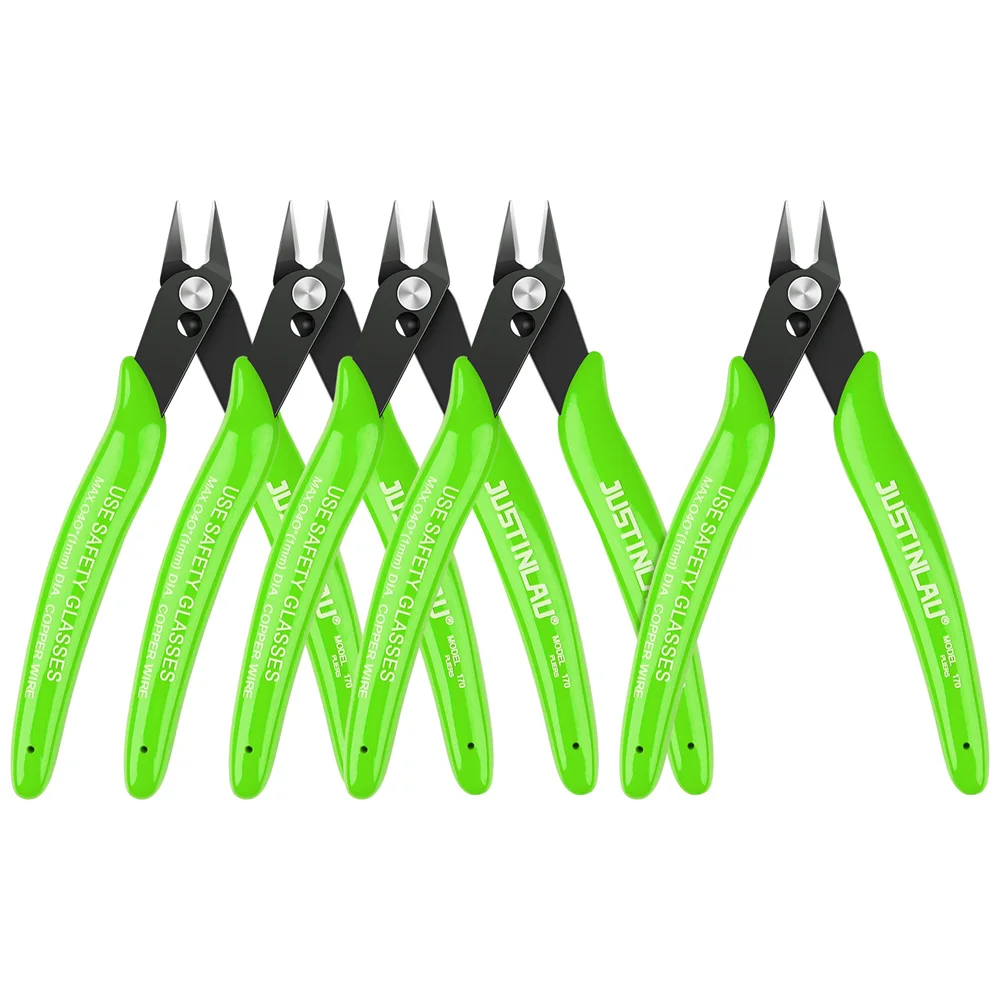 Set of green-handled wire cutters with sharp blades.