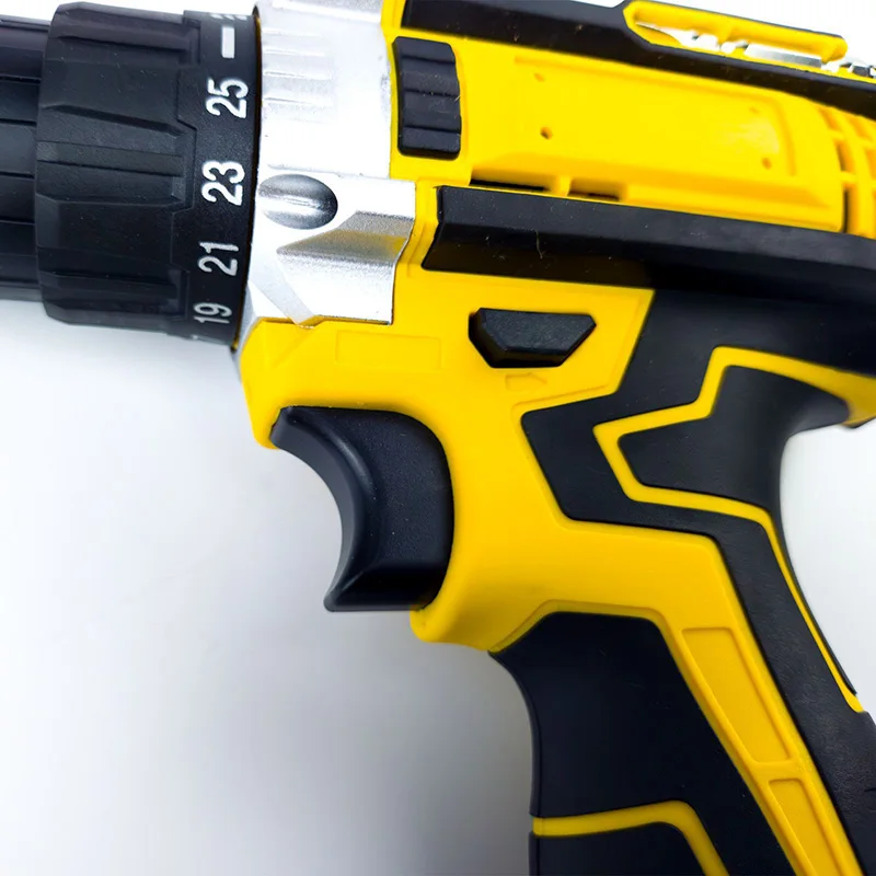 Close-up of a yellow and black power drill.