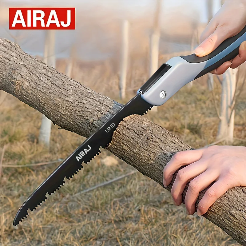 Person using an AIRAJ folding saw to cut a tree branch.