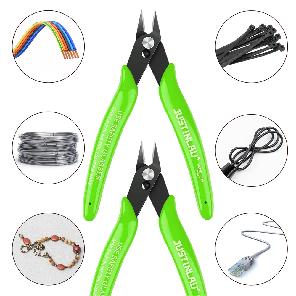 Green wire cutters surrounded by various wires and cables.